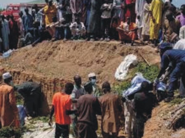 Desperate Youths Put Lives on the Line, Scramble for Fuel from Overturned Tanker in Edo