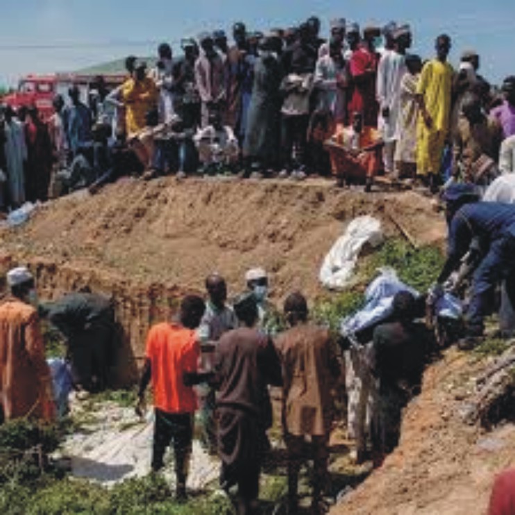 Desperate Youths Put Lives on the Line, Scramble for Fuel from Overturned Tanker in Edo