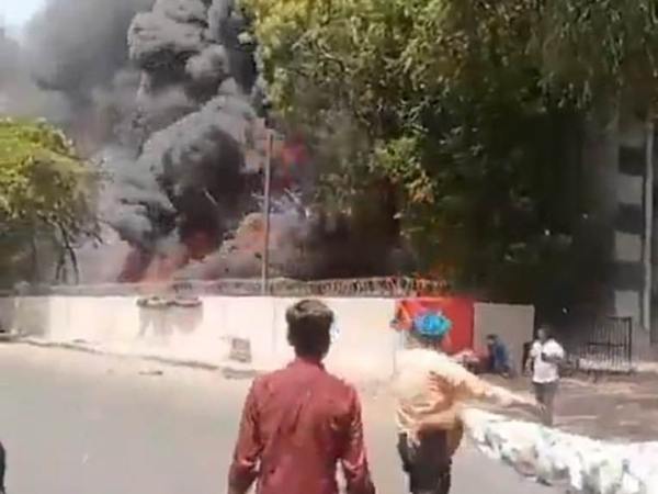Astonishing new footage shows plane EXPLODE behind British Air India crash survivor as he calmly walks away while talking on his phone