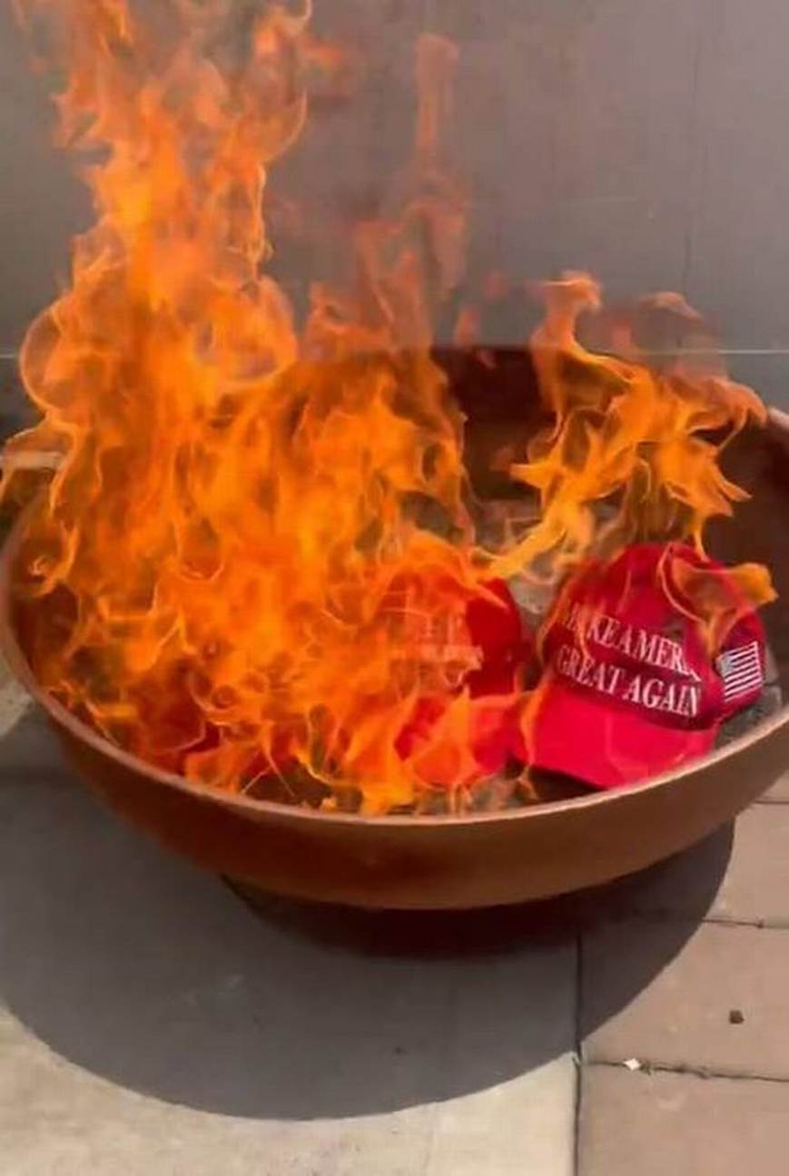 Donald Trump’s MAGA Hats burned In Protest As President Faces Backlash From Own Supporters Donald Trump’s MAGA Hats burned In Protest As President Faces Backlash From Own Supporters